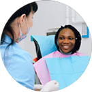 Dental expert talks with patient
